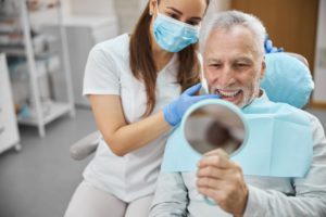 aging gentleman being happy with his new dental im 2021 09 03 14 36 59 utc 1