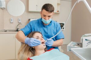male dentist treating teeth 2023 11 27 05 02 04 utc